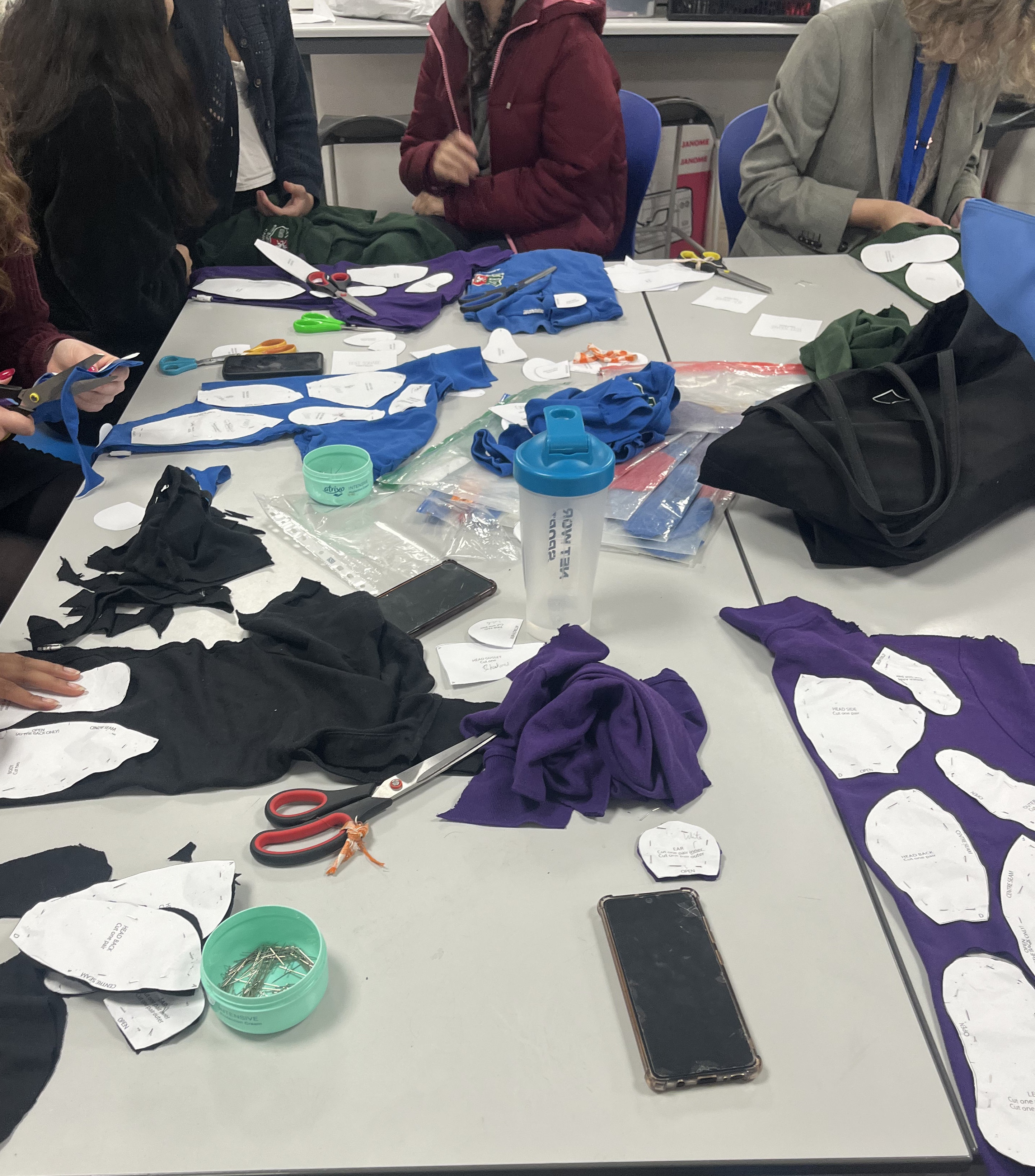 students creating teddy bears